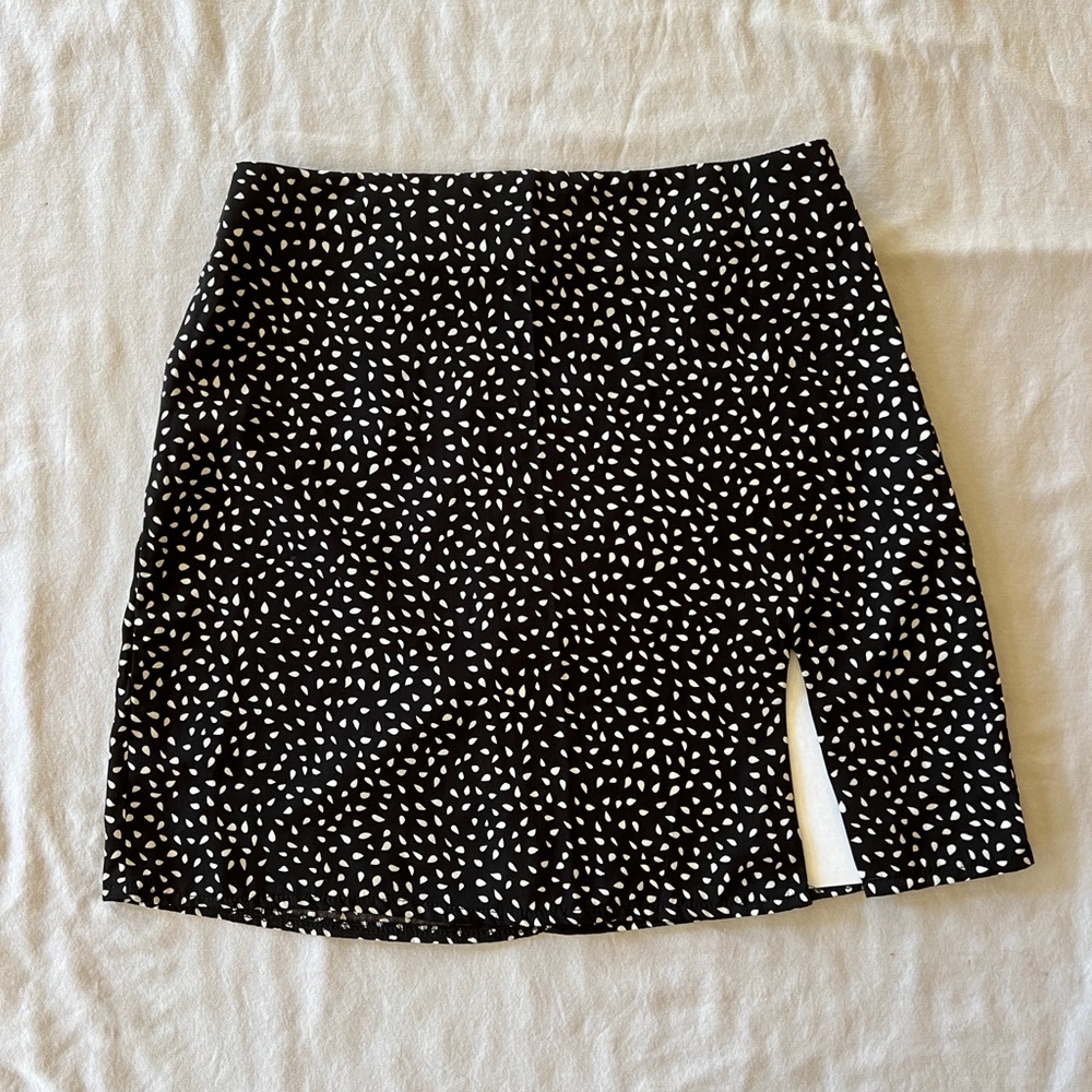 black spotted skirt